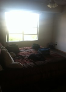 Our bedroom... don't mind the laundry on the bed